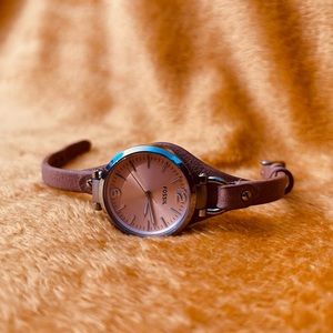 Women’s FOSSIL watch.